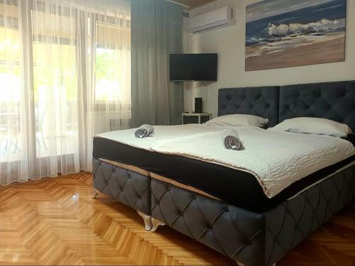 Ένα ή περισσότερα κρεβάτια σε δωμάτιο στο Studio apartman Ivana