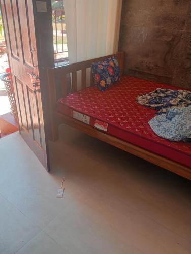 Postel nebo postele na pokoji v ubytování Kadal Beach Resort Malpe