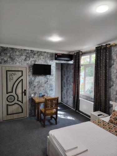 เตียงในห้องที่ Samar Oasis