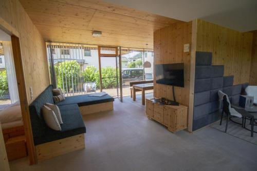 Area soggiorno di Ferienhaus Alpin, Apartment 1