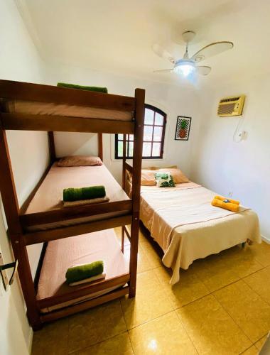 Postel nebo postele na pokoji v ubytování Hostel dos Gring0s