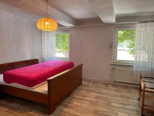 Postel nebo postele na pokoji v ubytování Brakel Mounteu-Ferinwohnung