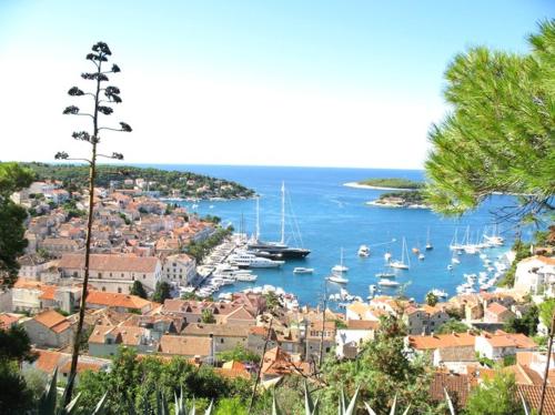 a view of a harbor with boats in the water at Old Town Hvar Rooms & Apartments in Hvar