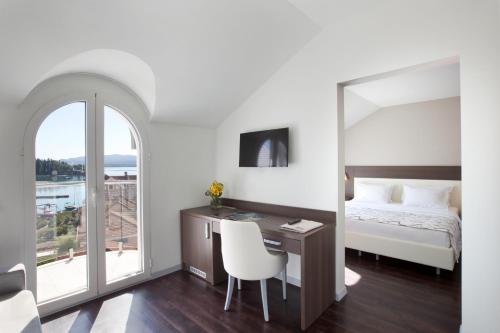 Postel nebo postele na pokoji v ubytování Hotel Palma