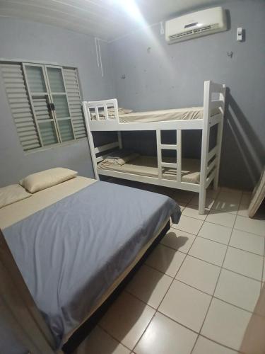Katil atau katil-katil dalam bilik di Casa Cabo Esquadra