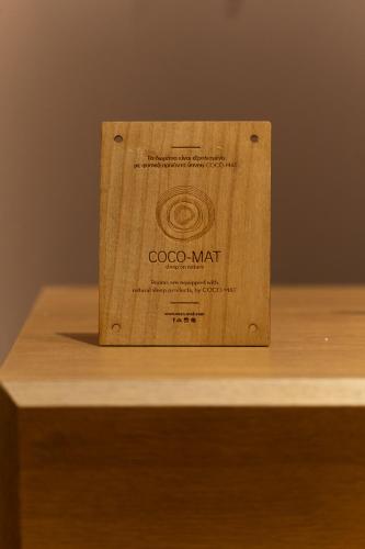 a wooden box sitting on top of a wooden table at Ode Aristofanous - Urban Boutique Hotel in Athens