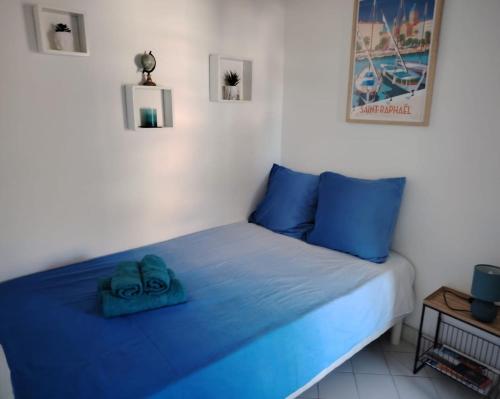 Katil atau katil-katil dalam bilik di Location Fréjus Plage