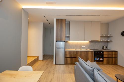 Η κουζίνα ή μικρή κουζίνα στο Infinity Apartments
