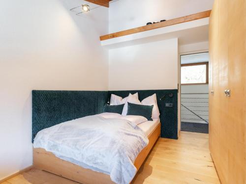Una cama o camas en una habitación de Im Wald