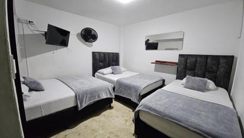 Hotel casa yotamaにあるベッド