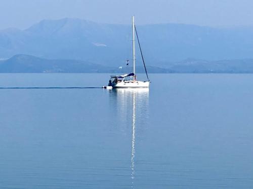a boat sitting on a large body of water at ARTE MARE d'Irene in Spárton