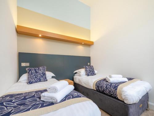 Cama o camas de una habitación en Villa Gallery- 27073