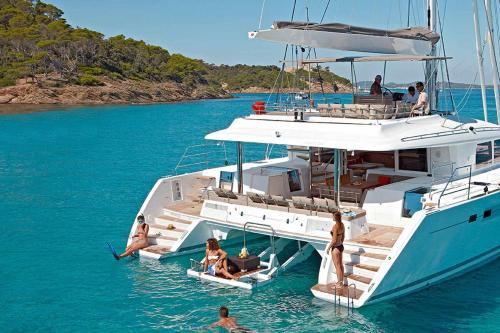 a group of people on a boat in the water at HappiCasaRD & Holistic House in Sosúa