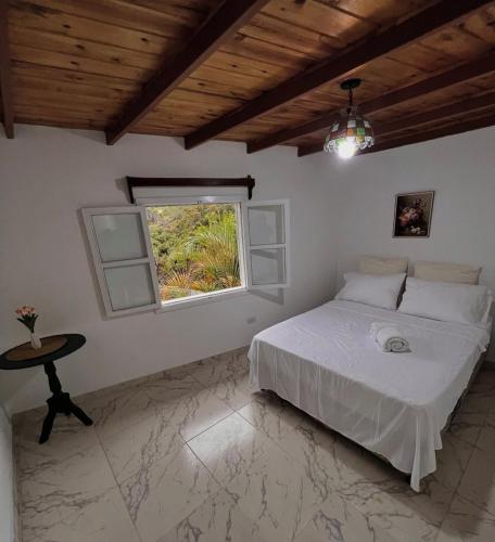 Postel nebo postele na pokoji v ubytování Cabañas Jenny