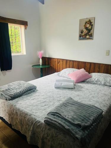 Postel nebo postele na pokoji v ubytování Cabañas Jenny