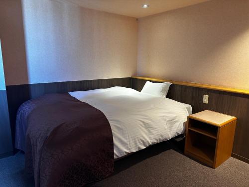 Katil atau katil-katil dalam bilik di Tabist Hirosaki Touei Hotel