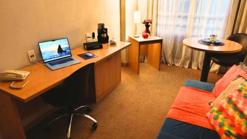 TV a/nebo společenská místnost v ubytování Hotel aeroporto Guarulhos
