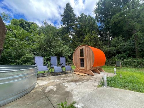 a group of chairs and a tiny house at Azure Palace 伊豆高原 in Ito