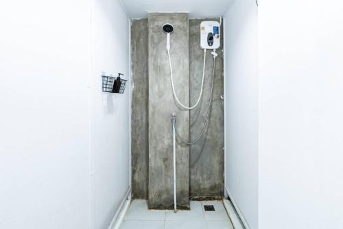 Et badeværelse på Mitr INN Sukhumvit 2 - BTS Nana มิตร อินน์ สุขุมวิทซอย 2 บีทีเอส นานา