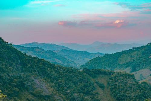 a view of a valley in the mountains at Quinta Maka VistaHermosa in Villeta