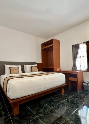 Letto o letti in una camera di Saka Boutique Hotel