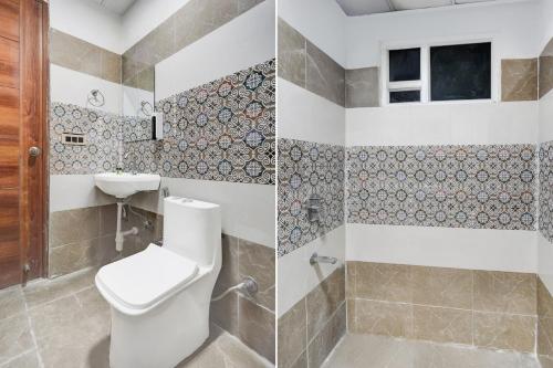 Super Townhouse Rispana Pul Haridwar Road Dehradunにあるバスルーム