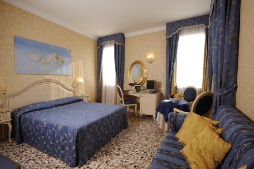 Voodi või voodid majutusasutuse Hotel Ca' Formenta toas