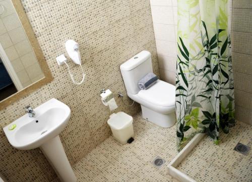 Koupelna v ubytování Hotel Kastro