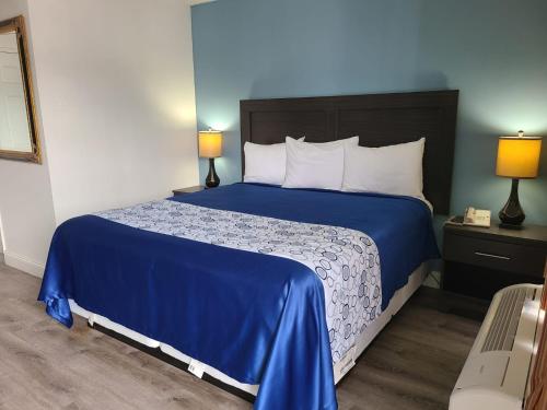 Ένα ή περισσότερα κρεβάτια σε δωμάτιο στο All Seasons Lodge