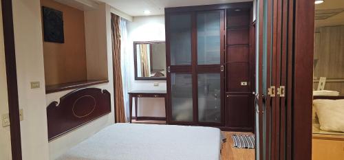 Ένα ή περισσότερα κρεβάτια σε δωμάτιο στο Condo Baan Somtavil