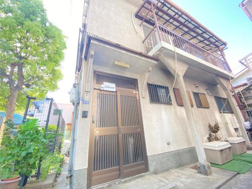 AkiraHome Tsurumibashi -Private two-story house, 6BR, 12Beds, max20ppl for big family