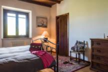 Postel nebo postele na pokoji v ubytování La confluenza casa vacanze