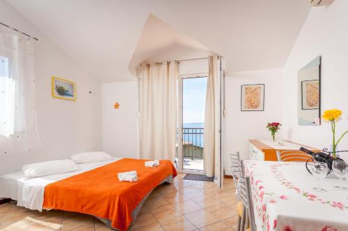 Postel nebo postele na pokoji v ubytování Guest House Davor Tomas