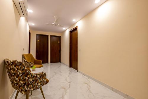 Ruang duduk di Limewood Stay Service Apartment 1BHK - Millennium City Centre