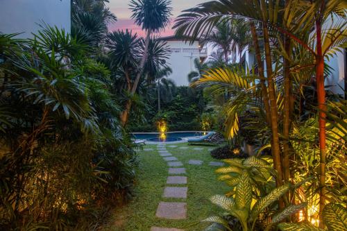 Κήπος έξω από το C131 Relaxed 1BR Getaway Near Beach & Cafés
