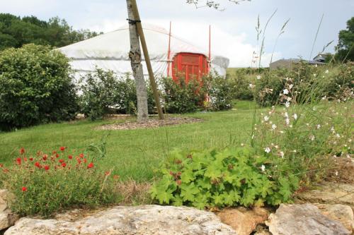 Κήπος έξω από το La Buissonnière Lodges
