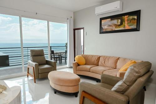 Χώρος καθιστικού στο Triton's Cozy Condominium