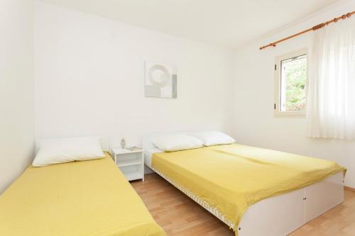 Katil atau katil-katil dalam bilik di Apartments Adriasol
