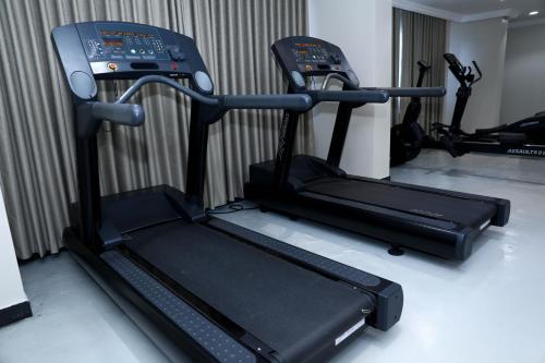 a gym with two exercise bikes in a room at فندق اهلا Hola Hotel in Al Jubail