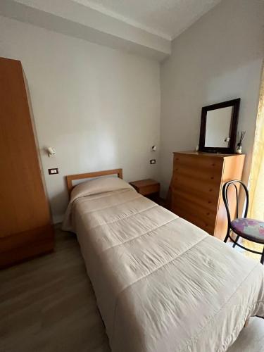 Postel nebo postele na pokoji v ubytování Affittacamere Dietro al Convento