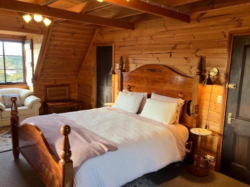 Postel nebo postele na pokoji v ubytování SeaHen Lodge