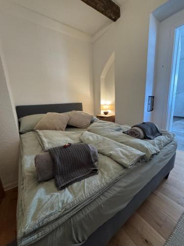 Ένα ή περισσότερα κρεβάτια σε δωμάτιο στο Haus mit Herz