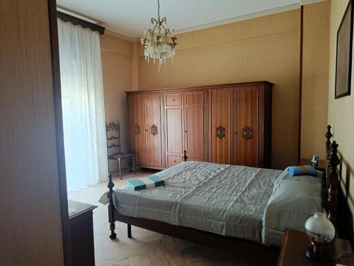 Postel nebo postele na pokoji v ubytování Appartamento Panoramico Corigliano Paese