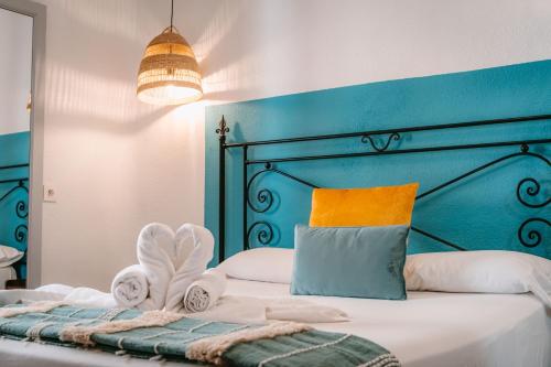 Una cama o camas en una habitación de Veronica Centro