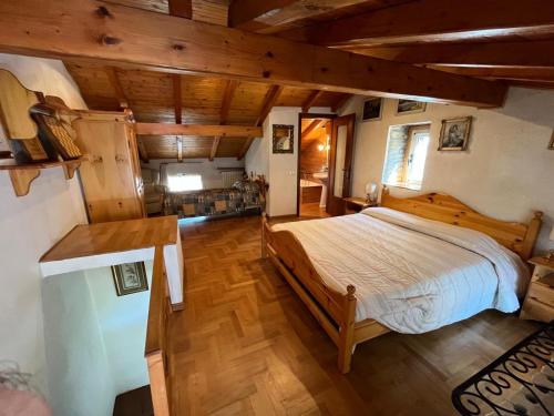 Ένα ή περισσότερα κρεβάτια σε δωμάτιο στο La corte di Barostro