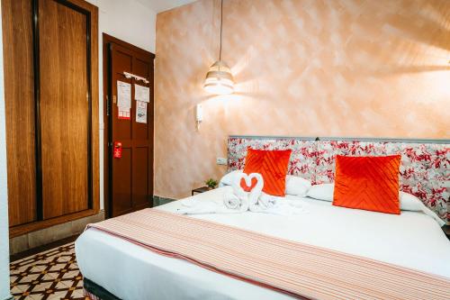 Una cama o camas en una habitación de Veronica Centro