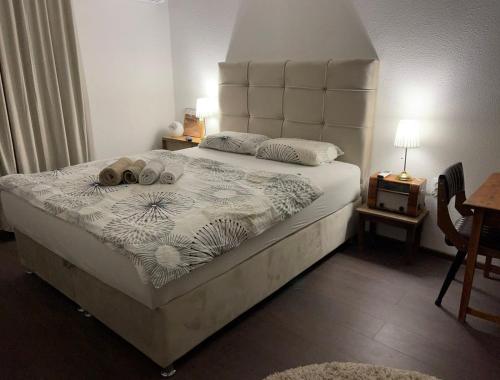 Кровать или кровати в номере Garden Lux Grujić Apartmani