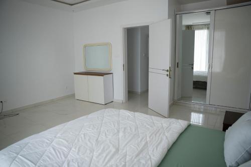 Residence Yacineにあるベッド