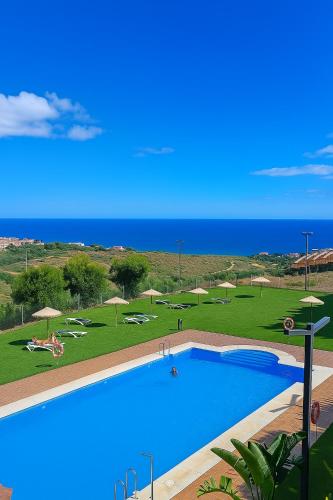 Small Oasis Nelson Mandela Apartment with sea view, two bedrooms, parking, terrace and pool