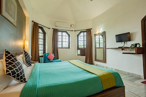 Letto o letti in una camera di Hilltop suites by 29 bungalow